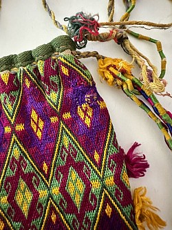 Close up of Afghan Dowry purse with repair