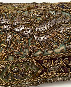 Close up of metal embroidered textile