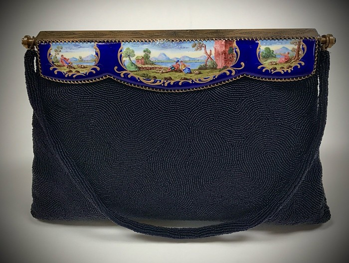 late 40s early 50s French (unlabeled)  enamel frame purse with a top opening hinge.