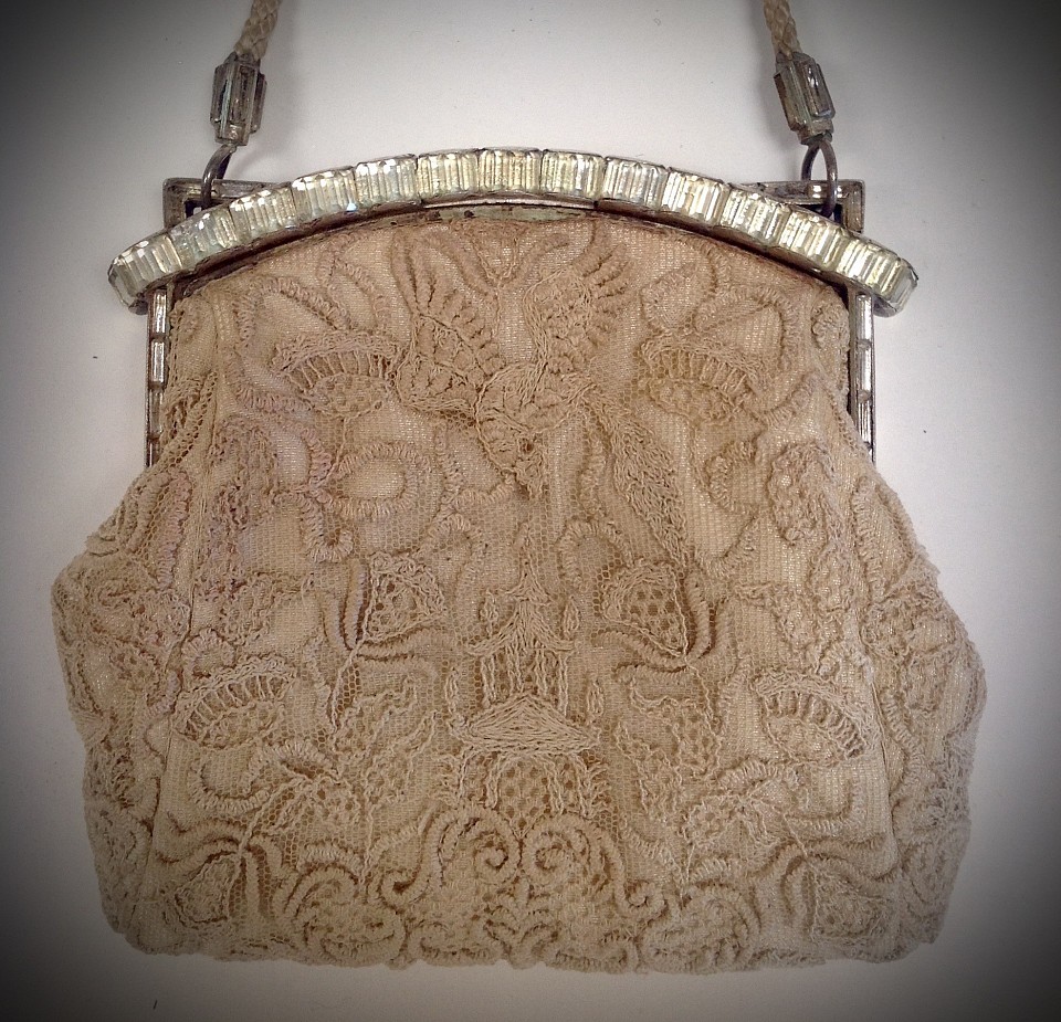 1920’s netted, embroidered with a glass jeweled frame